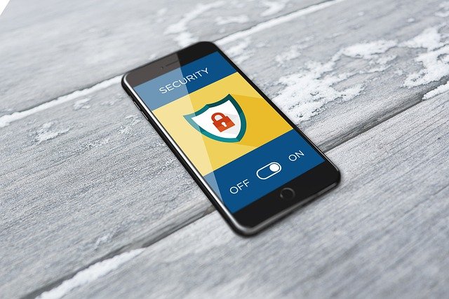 Stock image of a smart phone and a security app