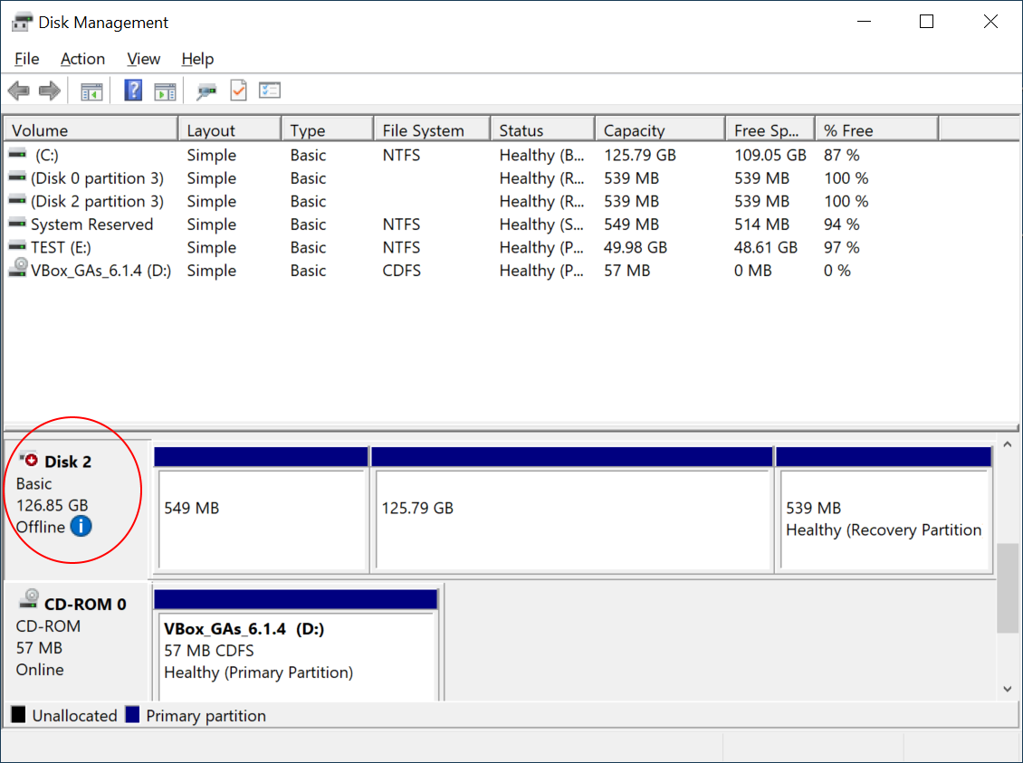 The Disk Management window contains a list of the drives attached to the computer