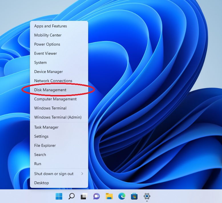Open Disk Manager by right-clicking on the Start button