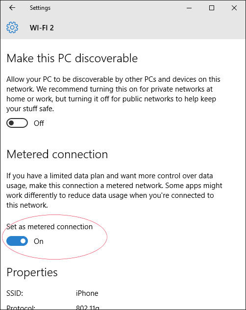 Enable the Set as metered connection option in Wi-Fi settings